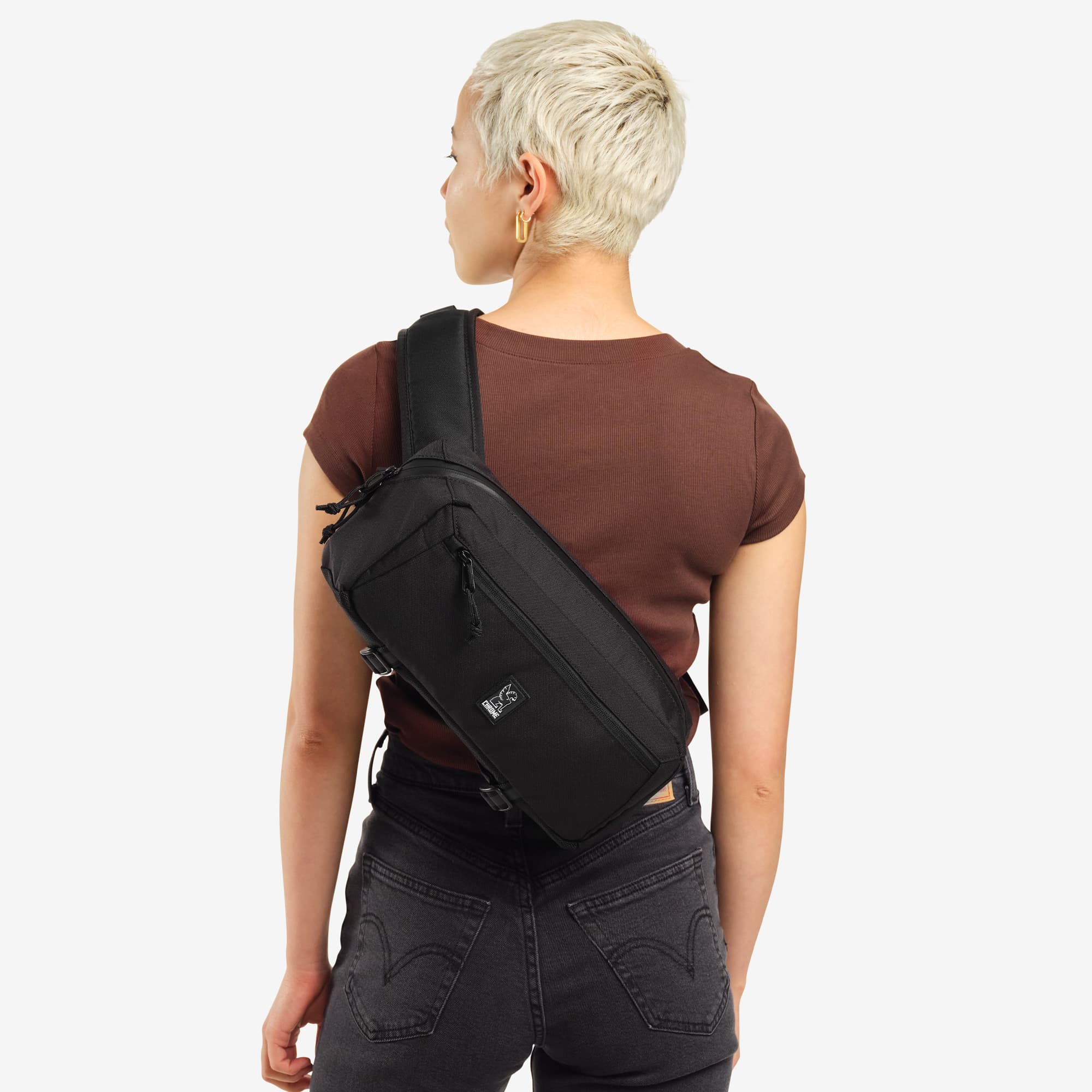 Mini Kadet Sling 5L in black worn by a woman